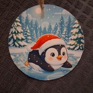 Festive Penguin Ornament with Red Santa Hat